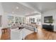 Bright, spacious living room with hardwood floors and lots of natural light at 853 Whispering Marsh Dr, Charleston, SC 29412