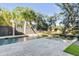 Relaxing pool area with modern patio, comfortable seating, and picturesque views of the natural landscape at 853 Whispering Marsh Dr, Charleston, SC 29412