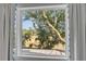 Scenic view from window showcasing lush greenery and open fields at 853 Whispering Marsh Dr, Charleston, SC 29412