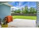 Spacious backyard featuring a concrete patio and privacy fence, perfect for outdoor gatherings at 8703 Jenny Lind St, North Charleston, SC 29406