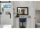 Relaxing bathroom includes a granite vanity, makeup mirror, vanity lighting, and a spacious walk-in shower at 8703 Jenny Lind St, North Charleston, SC 29406