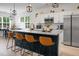 Beautiful kitchen features a large island, stainless steel appliances, and modern cabinetry at 8703 Jenny Lind St, North Charleston, SC 29406