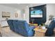Comfortable living room with plush seating, a large window, and tasteful decor is perfect for relaxing at 8703 Jenny Lind St, North Charleston, SC 29406