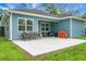 Charming backyard patio with seating, perfect for relaxing and enjoying the outdoors at 8703 Jenny Lind St, North Charleston, SC 29406