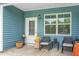 Welcoming patio entrance, complete with seating and stylish decor at 8703 Jenny Lind St, North Charleston, SC 29406