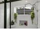Modern bathroom features a stylish walk-in shower with subway tile and rain shower head and a soap niche at 8703 Jenny Lind St, North Charleston, SC 29406