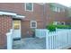 Private backyard featuring a brick patio with a white picket fence for added charm at 926 Lansing Dr # 926-G, Mount Pleasant, SC 29464