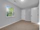 Neutral bedroom with a window letting in natural light, and two closet doors at 926 Lansing Dr # 926-G, Mount Pleasant, SC 29464