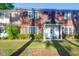 Charming townhome with brick facade, black shutters, and well-manicured landscaping at 926 Lansing Dr # 926-G, Mount Pleasant, SC 29464