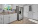 Modern kitchen boasts stainless steel appliances, ample white cabinetry, and granite countertops for a sleek design at 926 Lansing Dr # 926-G, Mount Pleasant, SC 29464