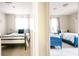 Bright bedrooms with coordinated decor, showcasing comfortable beds and a shared doorway at 960 Savage Road Rd, Charleston, SC 29414