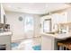 Bright, modern kitchen with stainless steel appliances and laminate flooring at 960 Savage Road Rd, Charleston, SC 29414