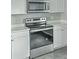 Modern kitchen with stainless steel oven and white cabinets at 960 Savage Road Rd, Charleston, SC 29414