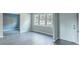 Bright living room featuring updated flooring, fresh paint, and natural light at 960 Savage Road Rd, Charleston, SC 29414