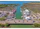 Stunning overhead shot of waterway featuring bridge, nearby shops, and lush vegetation at 968 Cummings Cir, Mount Pleasant, SC 29464