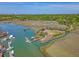 Scenic aerial view of a boat ramp, piers, and marshland with distant bridge views at 968 Cummings Cir, Mount Pleasant, SC 29464