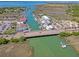 Beautiful aerial image highlights the waterway, bridge, and nearby commercial district at 968 Cummings Cir, Mount Pleasant, SC 29464