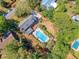 Birds-eye view highlighting a backyard oasis with a pool, inviting patio furniture, and a cozy fire pit at 968 Cummings Cir, Mount Pleasant, SC 29464