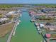 Aerial view showcasing a waterfront community with boating docks and commercial businesses nearby at 968 Cummings Cir, Mount Pleasant, SC 29464