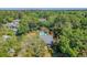 Lush neighborhood view featuring a private backyard swimming pool, mature trees, and well-maintained landscaping at 968 Cummings Cir, Mount Pleasant, SC 29464