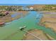 Picturesque aerial view of a waterway, docks, and marshland at 968 Cummings Cir, Mount Pleasant, SC 29464