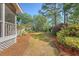 Expansive backyard with lush landscaping, a well-manicured lawn, and mature trees providing shade and privacy at 968 Cummings Cir, Mount Pleasant, SC 29464