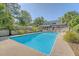 Large, inviting in-ground pool with clean water, surrounded by green landscaping and fenced perimeter at 968 Cummings Cir, Mount Pleasant, SC 29464