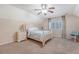 Well-lit bedroom features a ceiling fan, a comfortable bed, and a bright window at 968 Cummings Cir, Mount Pleasant, SC 29464
