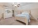 Sun-filled bedroom features a ceiling fan and a large dresser for storage at 968 Cummings Cir, Mount Pleasant, SC 29464