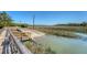 Picturesque boat ramp featuring an accessway to a river and greenery in the background, an ideal spot for boat enthusiasts at 968 Cummings Cir, Mount Pleasant, SC 29464