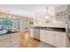 Bright kitchen featuring black countertops and white cabinetry at 968 Cummings Cir, Mount Pleasant, SC 29464
