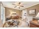 Office room with built in shelves, wood desk, and comfortable chair at 968 Cummings Cir, Mount Pleasant, SC 29464