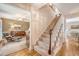Elegant staircase with wood and carpet accents, leading to the upper level and adjacent living spaces at 968 Cummings Cir, Mount Pleasant, SC 29464