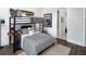 Stylish bunk bedroom featuring modern decor, wood planked walls and a surfboard at 000 Remington Trl, Johns Island, SC 29455