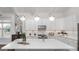 Well-lit kitchen with stainless steel appliances, a large island, and easy access to the dining area at 000 Remington Trl, Johns Island, SC 29455
