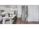 Bright, open kitchen with stainless steel appliances, large island and modern pendant lighting at 000 Remington Trl, Johns Island, SC 29455