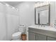 Bathroom featuring a double sink vanity with gray cabinets and a shower with a curtain at 1024 Willowood Ave, Goose Creek, SC 29445