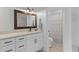 Elegant bathroom featuring a single sink vanity with modern fixtures and a shower with curtain at 1024 Willowood Ave, Goose Creek, SC 29445
