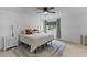 Spacious bedroom with a queen bed, area rug, and natural light from the window at 1024 Willowood Ave, Goose Creek, SC 29445