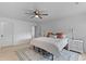 Spacious main bedroom featuring a ceiling fan, light wood floors, and neutral decor at 1024 Willowood Ave, Goose Creek, SC 29445