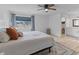 Relaxing main bedroom with a window, adjacent bathroom, and luxury vinyl plank flooring at 1024 Willowood Ave, Goose Creek, SC 29445