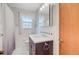 Bathroom features a white vanity with marble countertop, tile flooring and a shower at 106 Newington Rd, Summerville, SC 29485