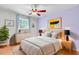 Cozy bedroom with soft lighting, dresser, decorative accents, and a comfortable bed at 106 Newington Rd, Summerville, SC 29485