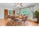 Elegant dining room with hardwood floors and a large window at 106 Newington Rd, Summerville, SC 29485