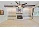 Bright living room with fireplace, beamed ceiling, and ample natural light at 106 Newington Rd, Summerville, SC 29485