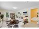 Bright living room featuring a white sofa, decorative rug, and access to other rooms at 106 Newington Rd, Summerville, SC 29485