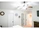 Clean, well lit bedroom with many doors and shelves, and a ceiling fan at 109 Holly St, Summerville, SC 29485