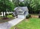 Beautiful two-story home featuring a well-maintained lawn, attached garage, and a classic exterior at 109 Holly St, Summerville, SC 29485