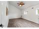 Bedroom featuring wood look floors, windows and ceiling fan at 1142 Village Creek Ln # 4, Mount Pleasant, SC 29464