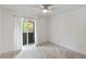 Bright bedroom with carpet and a sliding glass door to a balcony at 1142 Village Creek Ln # 4, Mount Pleasant, SC 29464